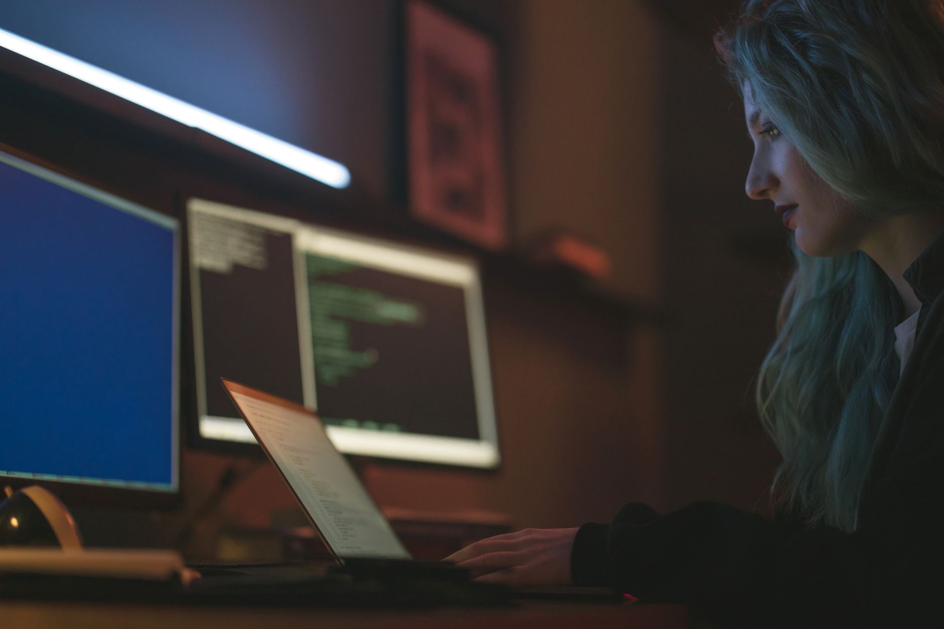 UK small business owner reviewing cyber essentials certification and cybersecurity on a laptop