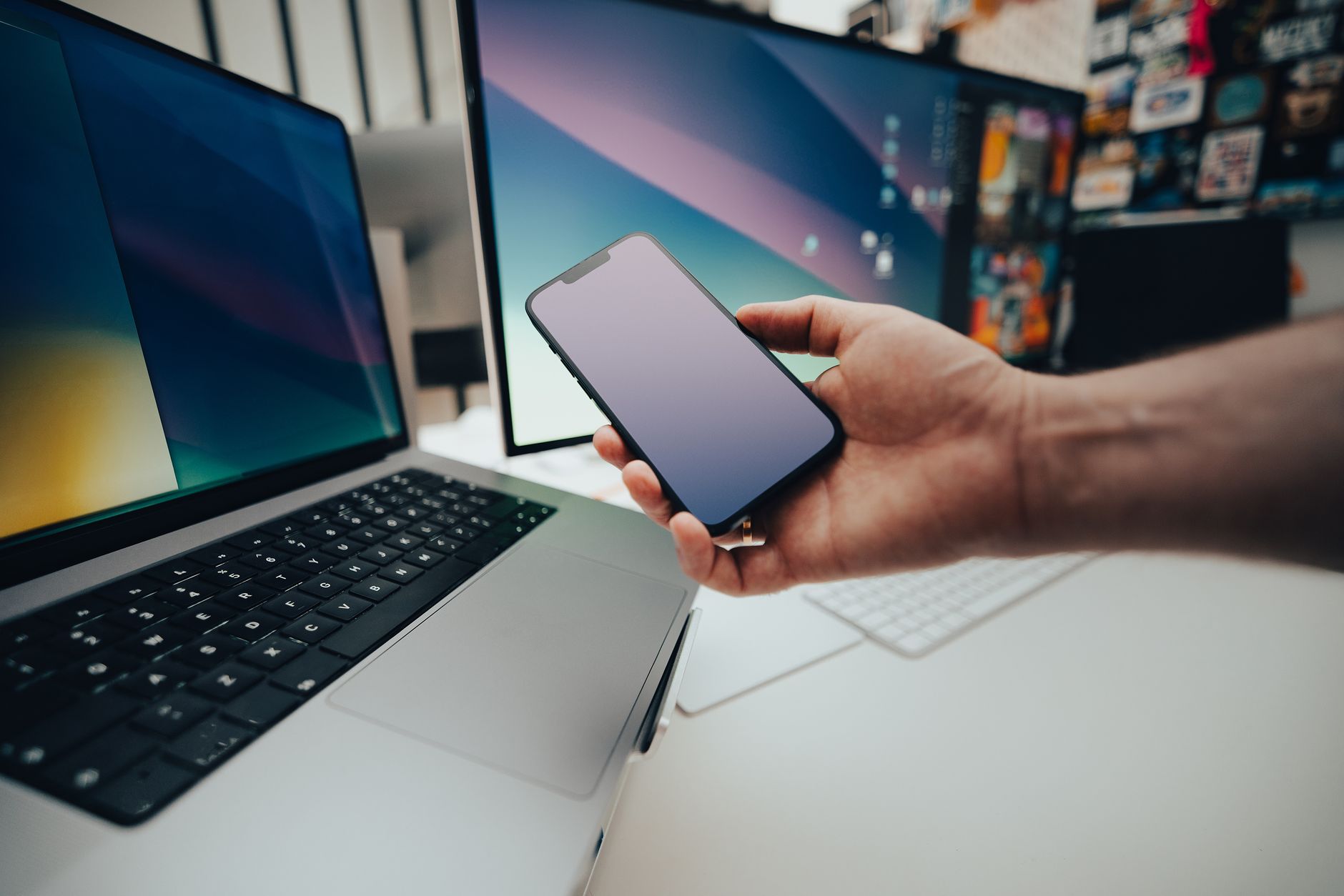 Small business owner setting up no code workflow automation on a laptop