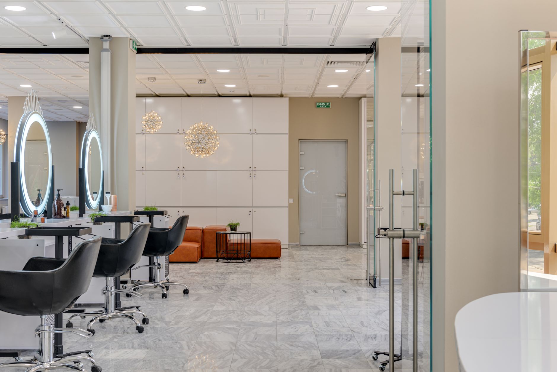 Modern beauty salon interior with styling stations and mirrors, illustrating business rates reform impact on SMEs